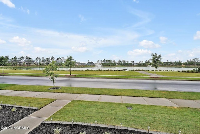 view of yard with a water view