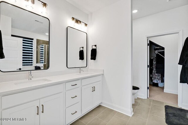 empty room with recessed lighting, baseboards, and wood finished floors