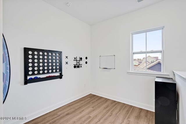 carpeted bedroom featuring ceiling fan, visible vents, and baseboards