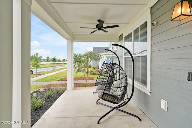 view of patio featuring a porch and a ceiling fan