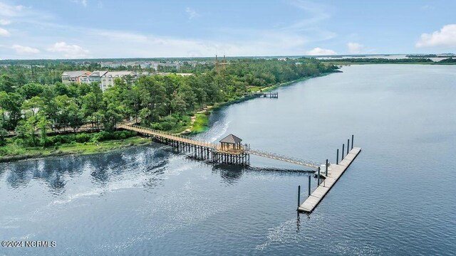 view of dock with a water view and a gazebo