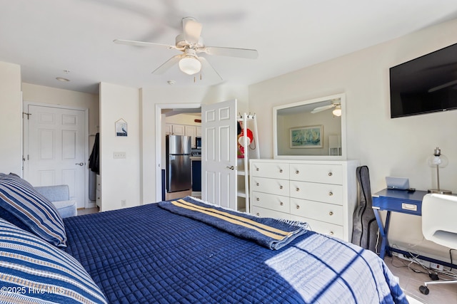 bedroom with a ceiling fan and freestanding refrigerator