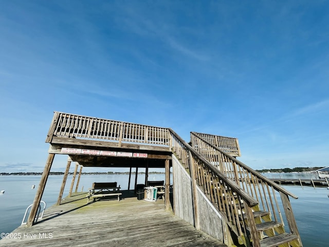 view of dock with a water view