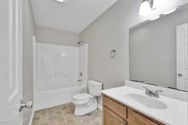 bathroom with  shower combination, vanity, and toilet