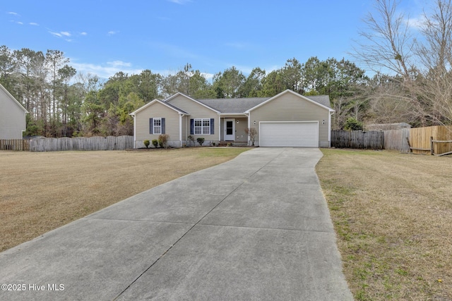 ranch-style house featuring an attached garage, fence, concrete driveway, and a front yard