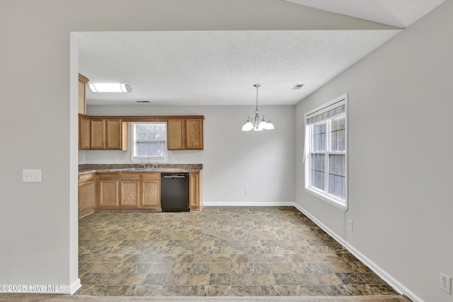 kitchen featuring a wealth of natural light, baseboards, dishwasher, a chandelier, and a sink