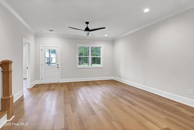 interior space with recessed lighting, light wood-style floors, ornamental molding, ceiling fan, and baseboards