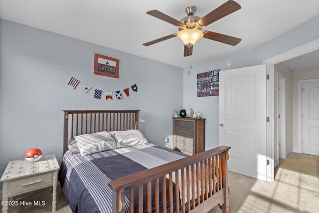 bedroom featuring light carpet and ceiling fan