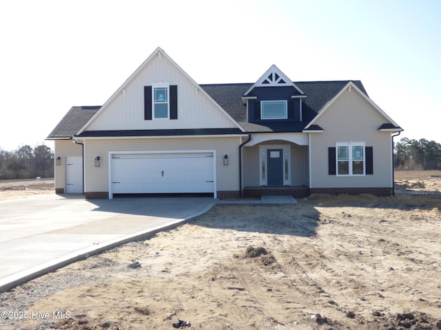 view of front of home with concrete driveway