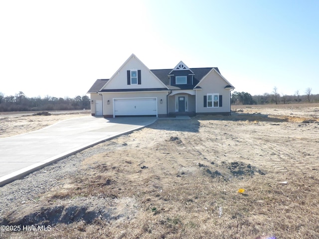 view of front facade featuring concrete driveway