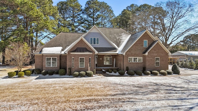 view of front of home with brick siding