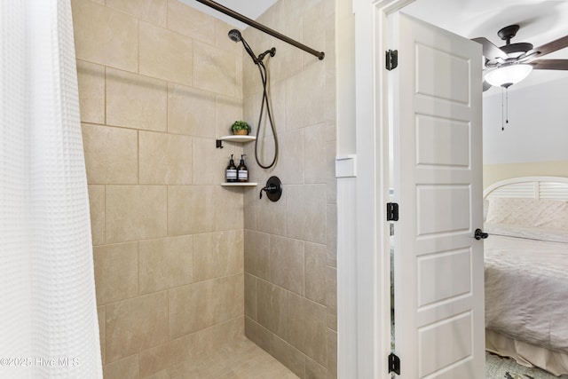 full bath featuring ceiling fan and tiled shower