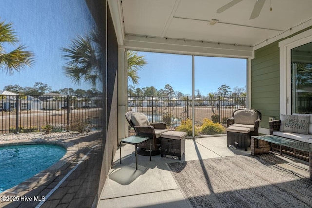 exterior space featuring a fenced in pool, ceiling fan, and fence