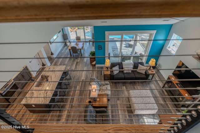 interior details with baseboards and wood finished floors