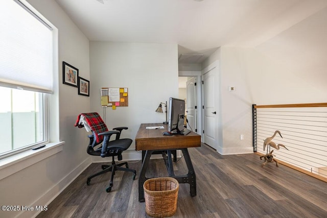 office featuring baseboards and dark wood-type flooring