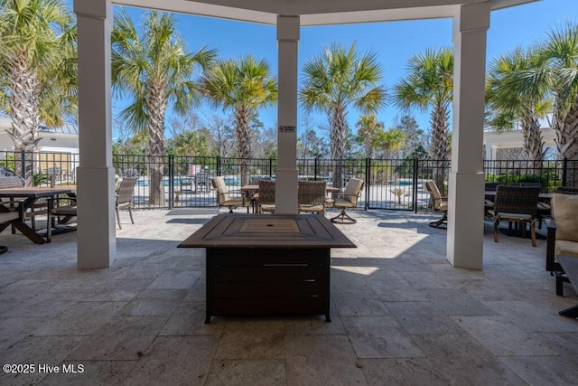 view of patio / terrace featuring fence