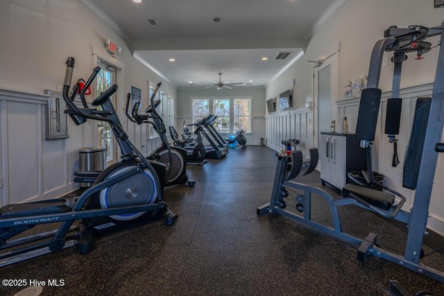 workout area featuring ceiling fan, visible vents, crown molding, and recessed lighting