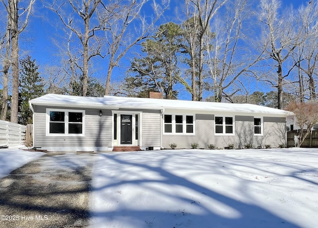 ranch-style house with a chimney