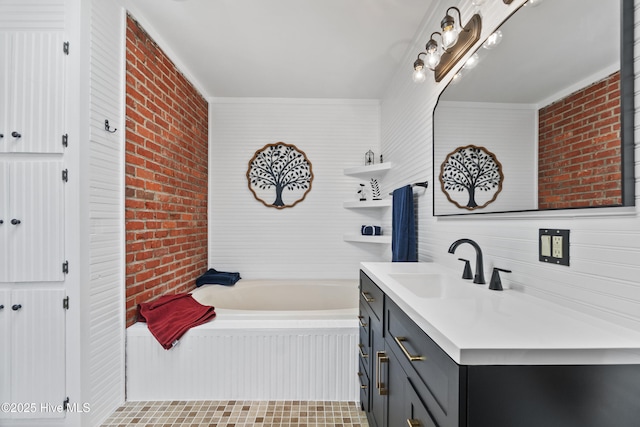 bathroom with a garden tub and vanity