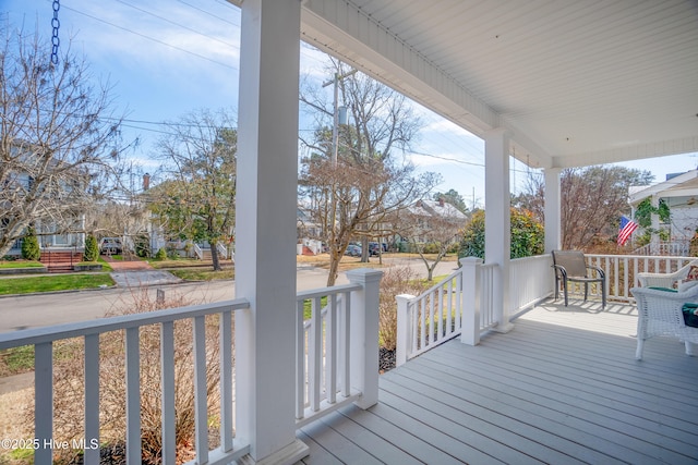 wooden deck with a porch