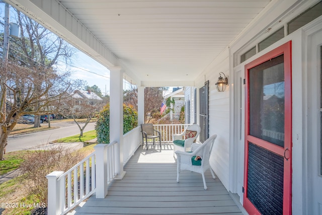 wooden terrace with covered porch