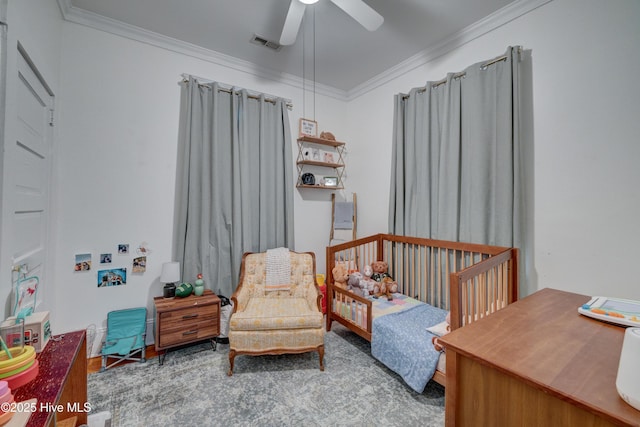 bedroom with a ceiling fan, visible vents, and crown molding