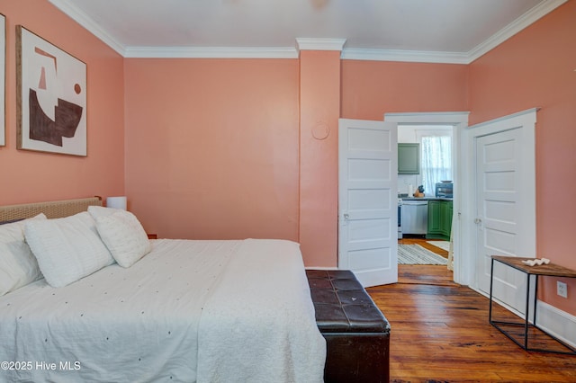 bedroom featuring dark wood-style floors and crown molding