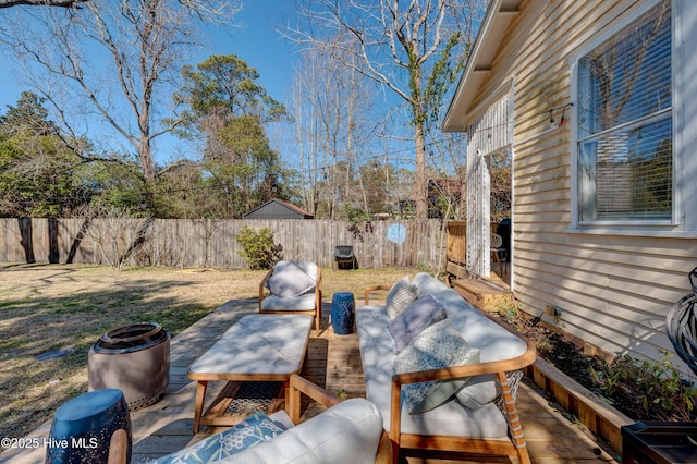 view of patio / terrace featuring an outdoor hangout area and a fenced backyard