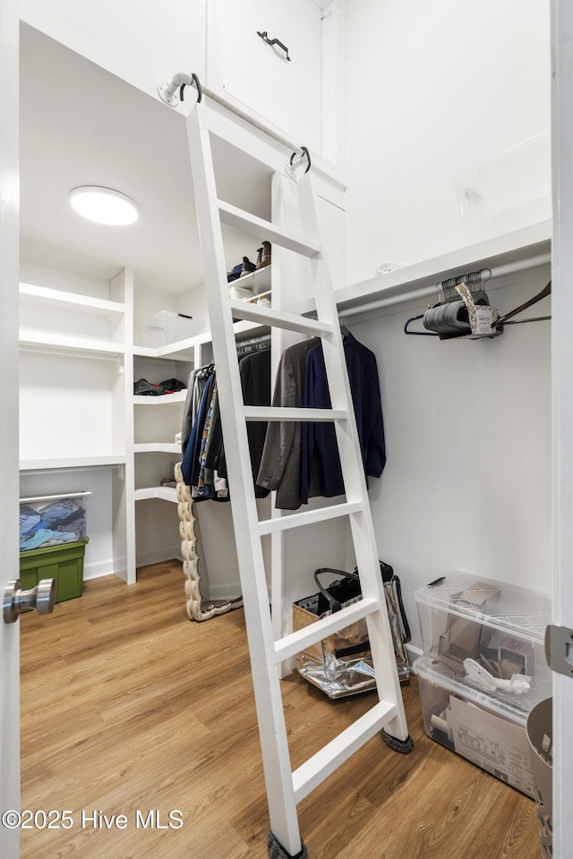 212 Florida Ave, Carolina Beach, NC 28428 - spacious closet with wood finished floors