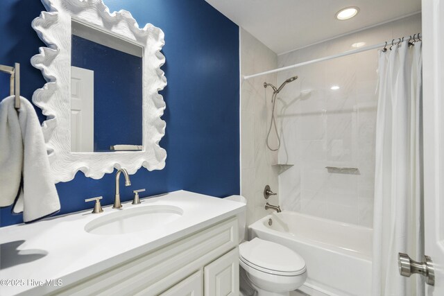212 Florida Ave, Carolina Beach, NC 28428 - bathroom featuring vanity, shower / bathtub combination with curtain, toilet, and recessed lighting