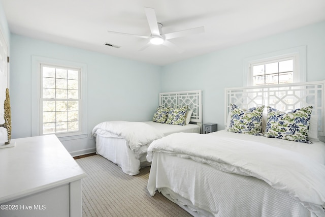 212 Florida Ave, Carolina Beach, NC 28428 - bedroom with ceiling fan and baseboards