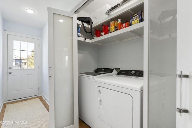 212 Florida Ave, Carolina Beach, NC 28428 - laundry room with separate washer and dryer, light wood-style flooring, baseboards, and recessed lighting