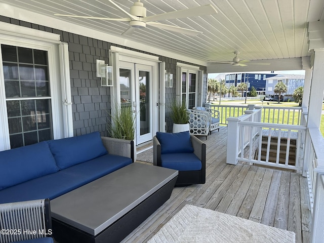 212 Florida Ave, Carolina Beach, NC 28428 - porch with a ceiling fan and outdoor lounge area
