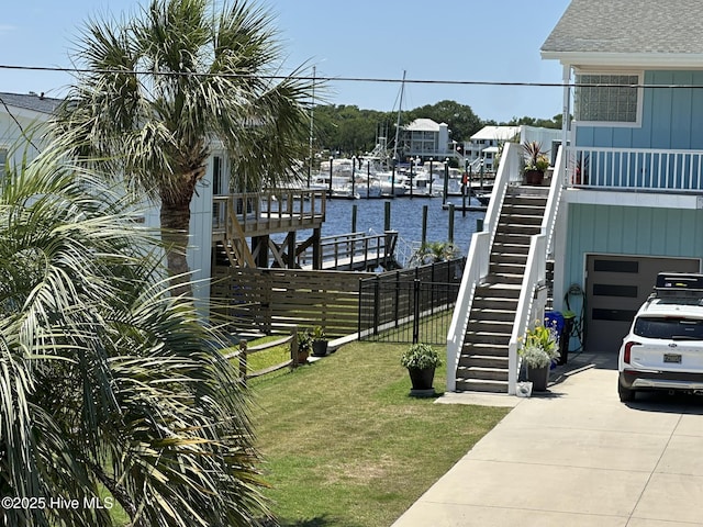 212 Florida Ave, Carolina Beach, NC 28428 - dock area featuring stairs and a water view
