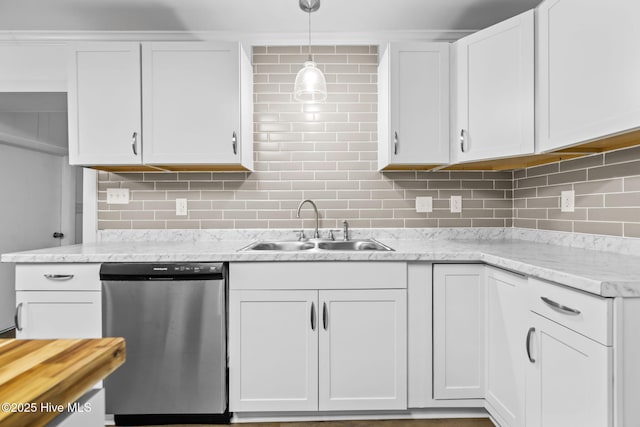 kitchen with white cabinets, dishwasher, backsplash, decorative light fixtures, and a sink