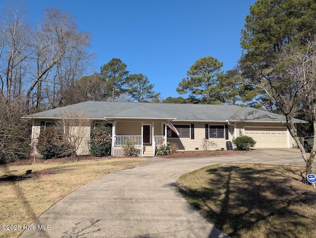 ranch-style home featuring a garage, concrete driveway, a porch, crawl space, and a front lawn