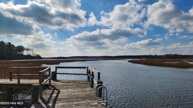 view of dock with a water view