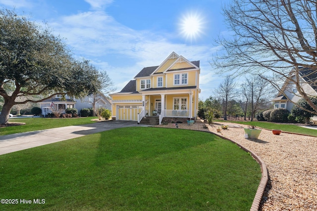 craftsman house with driveway, a porch, and a front yard