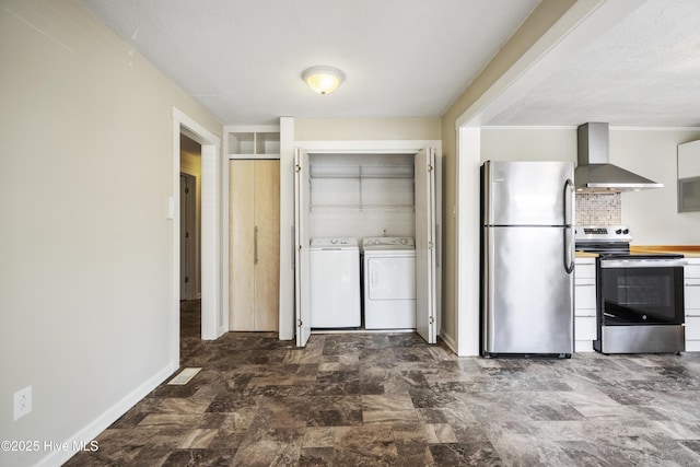 kitchen with appliances with stainless steel finishes, a textured ceiling, wall chimney range hood, separate washer and dryer, and baseboards