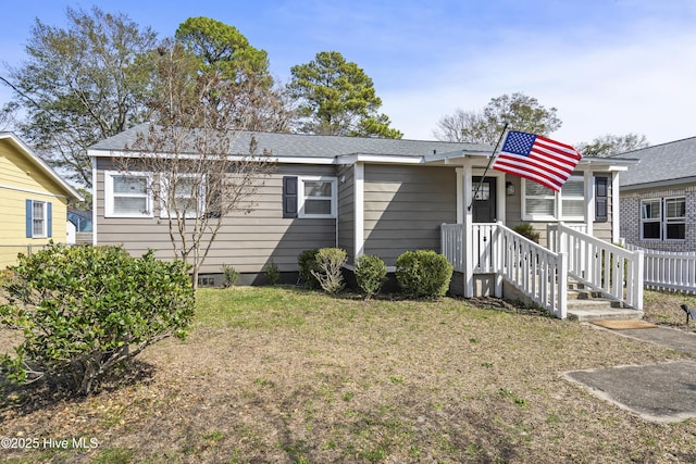 view of front of house with a front lawn