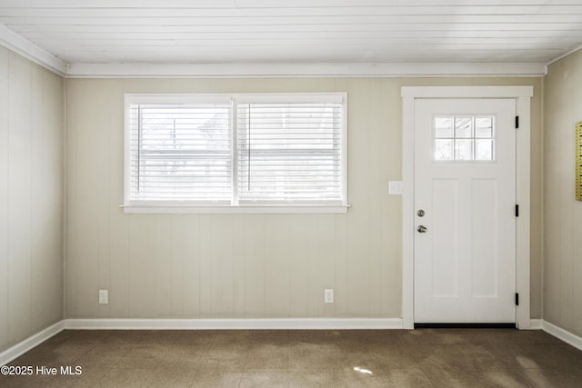 entryway featuring baseboards