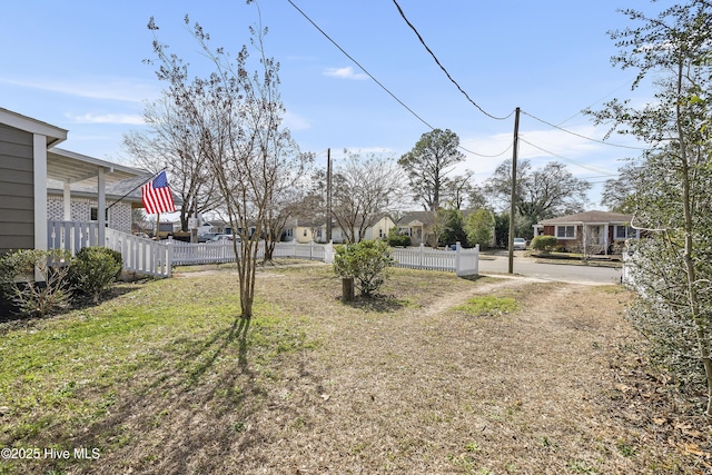 view of yard with fence