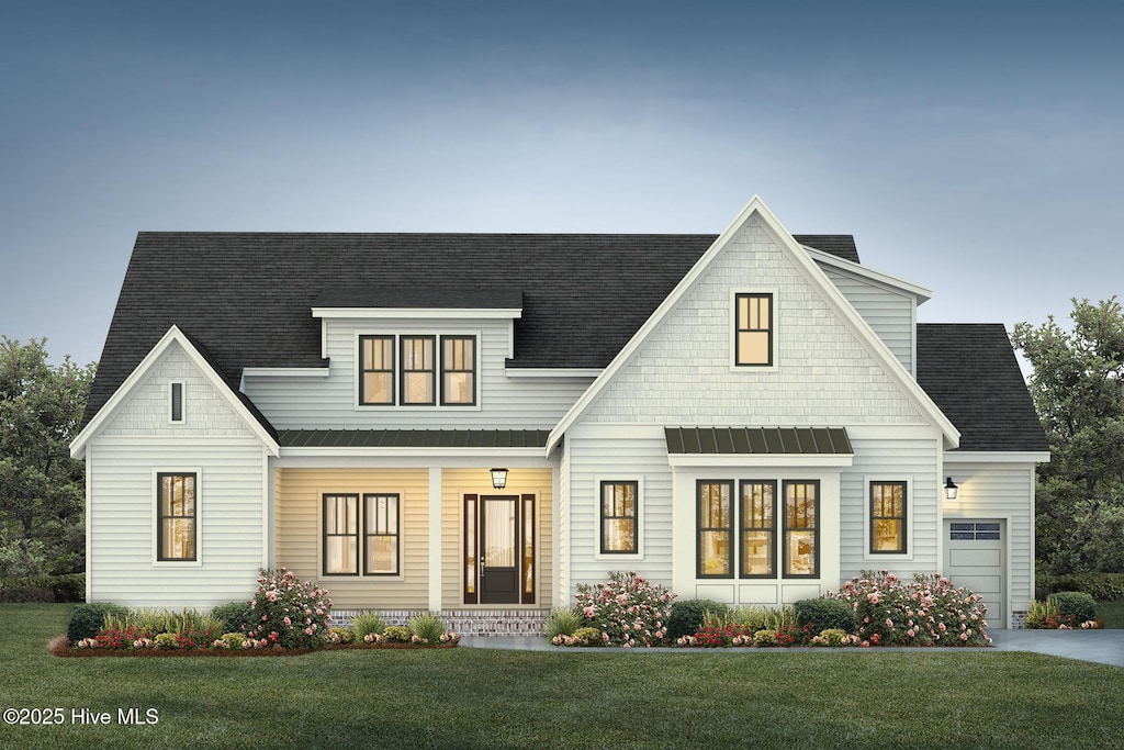255 Hollycrest Dr, Pinehurst, NC 28374 - modern inspired farmhouse with a front yard, a standing seam roof, roof with shingles, and metal roof