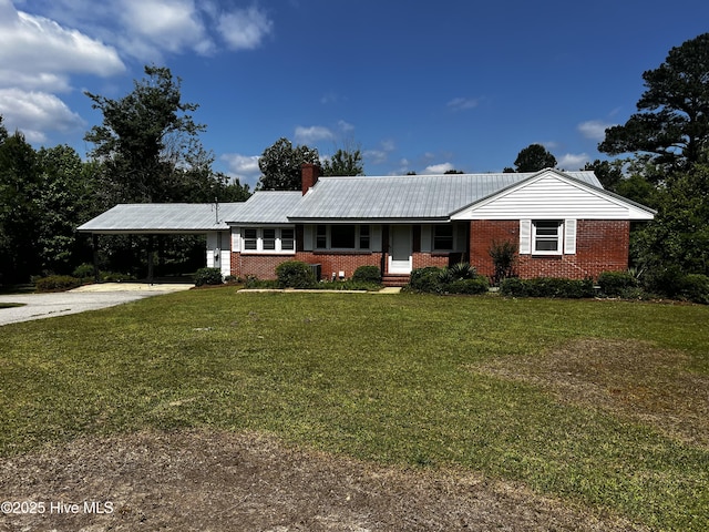 323 Hoover Rd, White Oak, NC 28399 - ranch-style home with driveway, brick siding, an attached carport, and a front yard