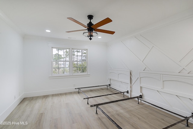 unfurnished bedroom featuring visible vents, baseboards, ornamental molding, light wood-style floors, and recessed lighting