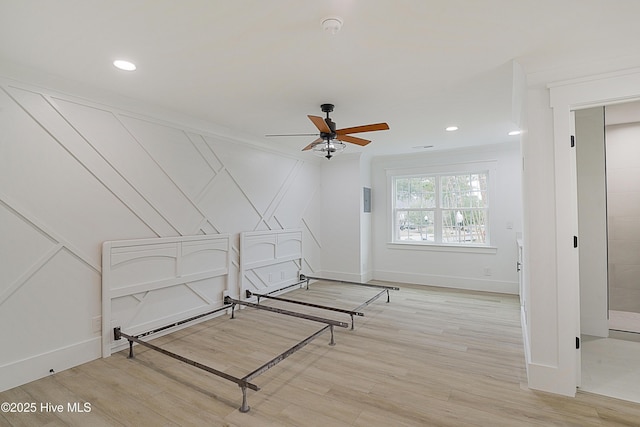 unfurnished bedroom featuring baseboards, light wood-style flooring, and recessed lighting