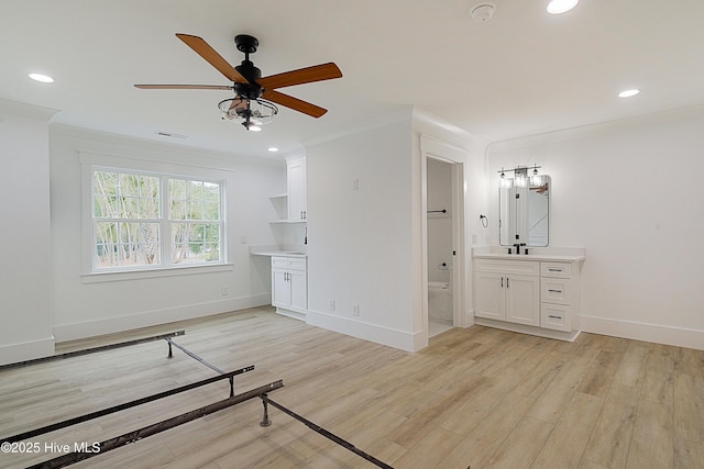 unfurnished bedroom featuring ornamental molding, recessed lighting, and light wood-style floors