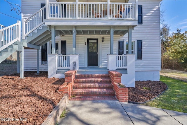 property entrance with covered porch