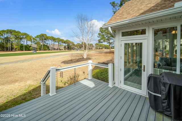 deck featuring a grill