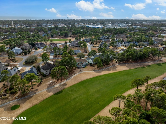 aerial view with view of golf course and a residential view